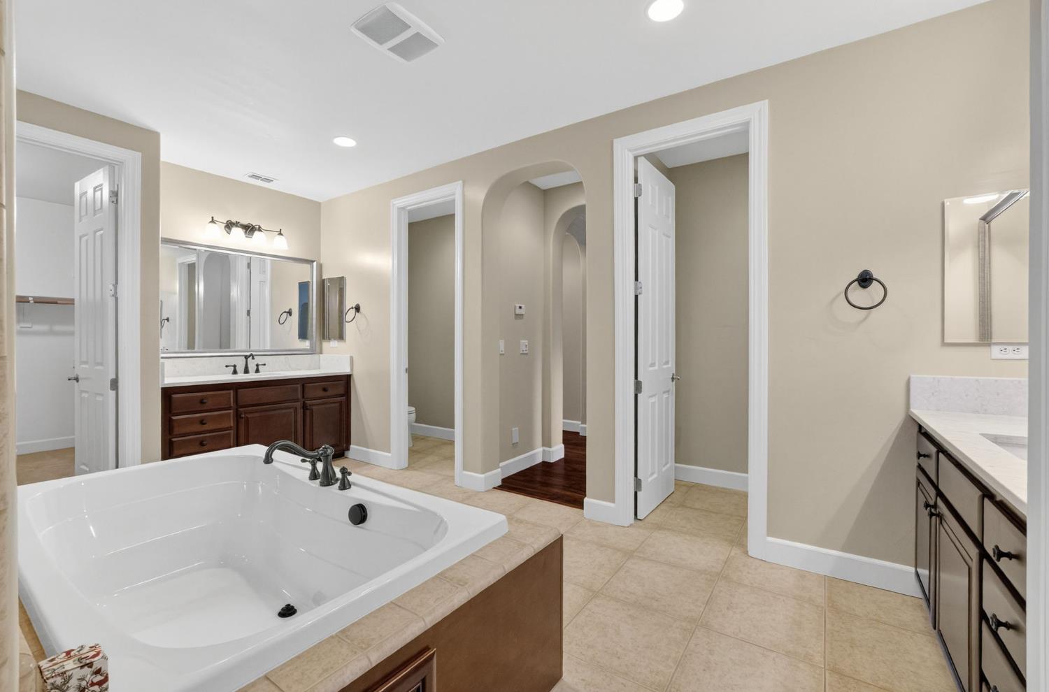 2050 Impressionist Way El Dorado Hills, CA 95762 - Photo 65 of 83 a bathroom with a sink double vanity and a mirror