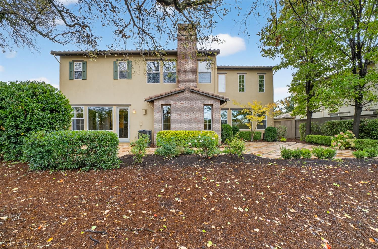 2050 Impressionist Way El Dorado Hills, CA 95762 - Photo 68 of 83 a front view of a house with a garden