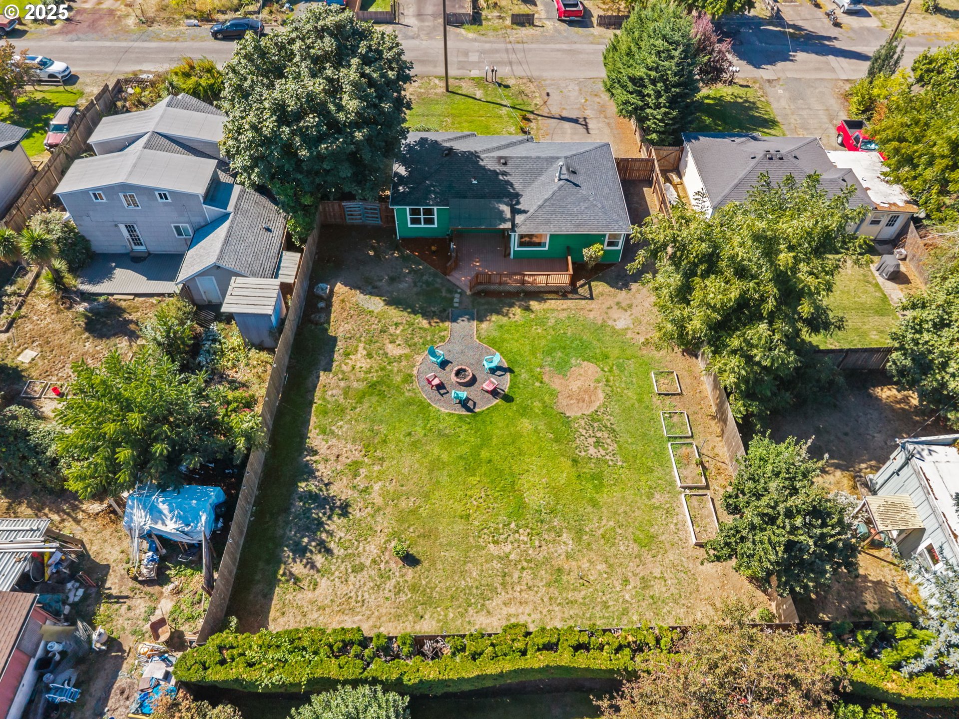 1025 54th Street Springfield, OR 97478 - Photo 24 of 31 an aerial view of house with yard swimming pool and outdoor seating