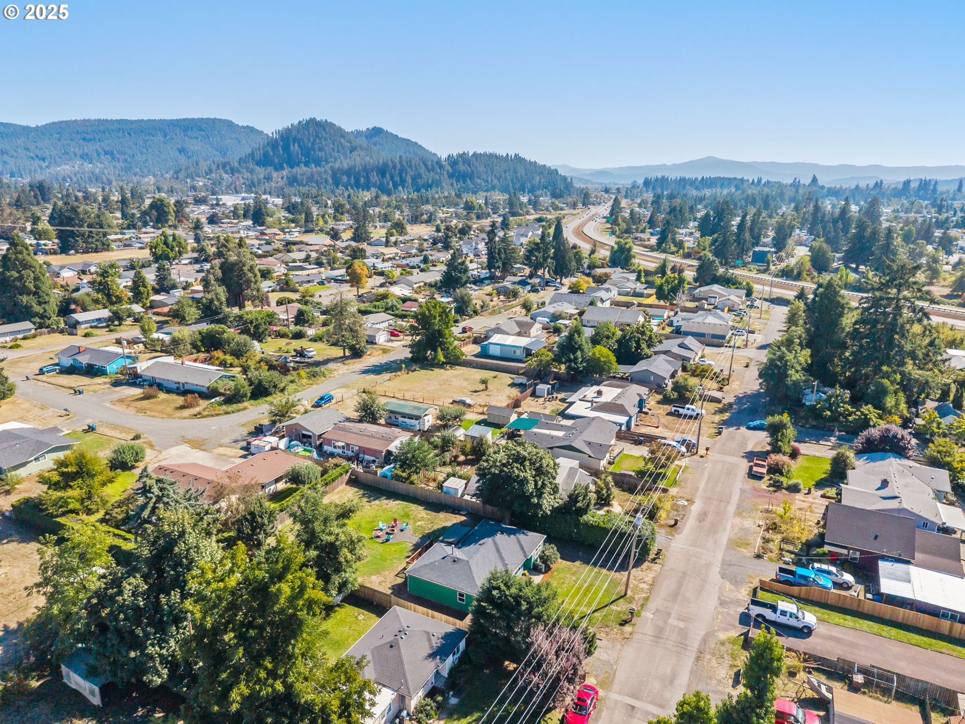 1025 54th Street Springfield, OR 97478 - Photo 27 of 31 an aerial view of residential houses and outdoor space