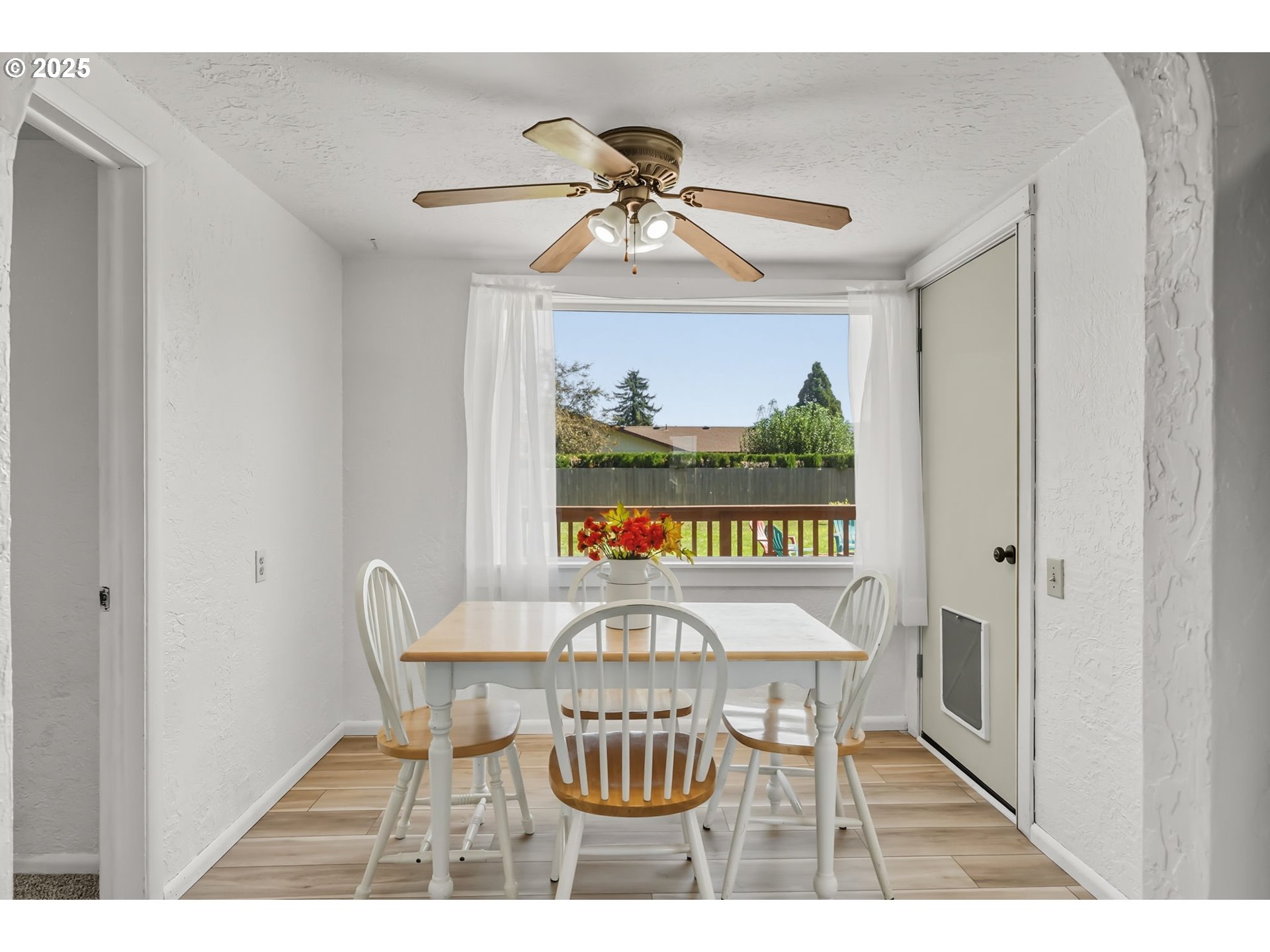 1025 54th Street Springfield, OR 97478 - Photo 10 of 31 a view of a dining room with furniture window and outside view