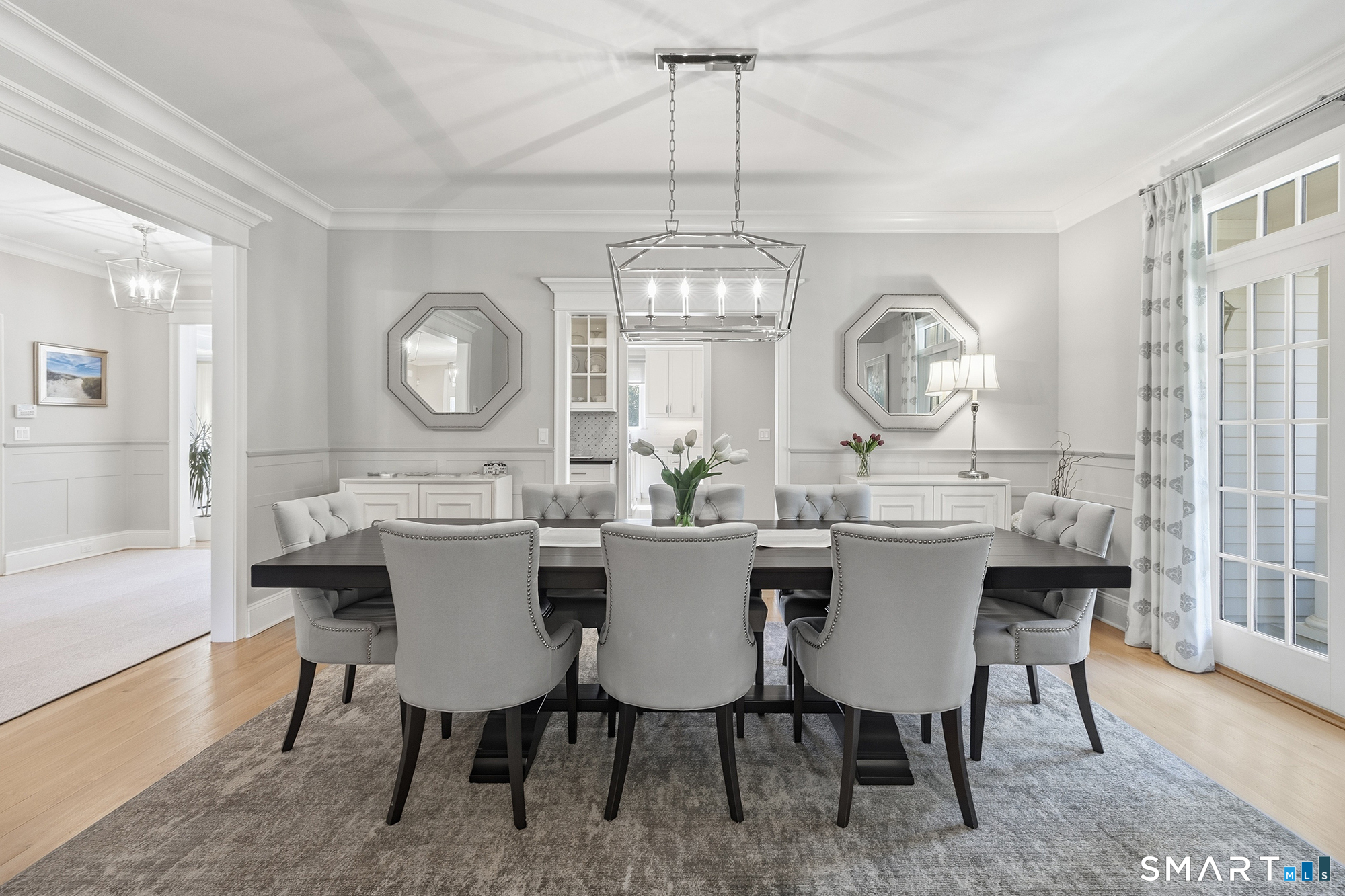 263 Peaceable Street Ridgefield, CT 06877 - Photo 12 of 40 Large dining room with French doors out to wraparound porch