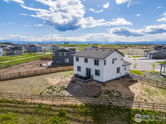 a view of a house with a ocean view