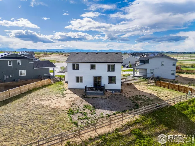 a view of a swimming pool with a lounge chairs