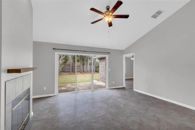 a view of an empty room with a window