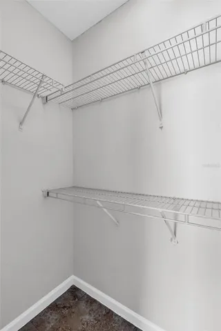 a view of a room with racks on the wall