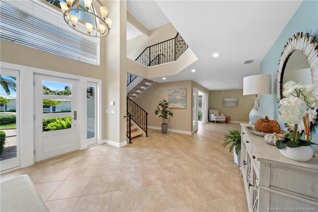 7 Island Road Stuart, FL 34996 - Photo 15 of 67 a view of a livingroom with furniture and a hallway