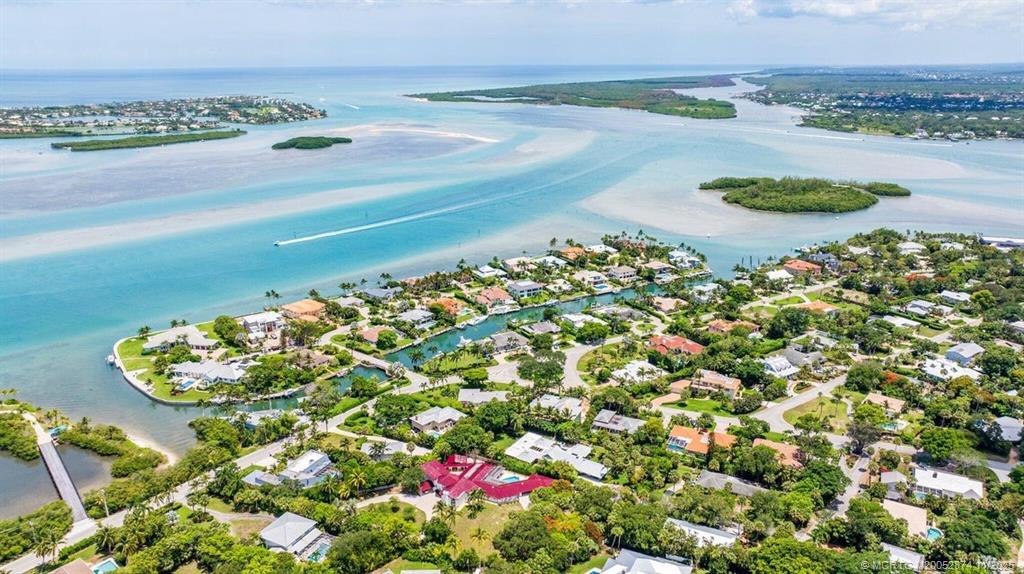 7 Island Road Stuart, FL 34996 - Photo 2 of 67 a view of a lake with an outdoor space