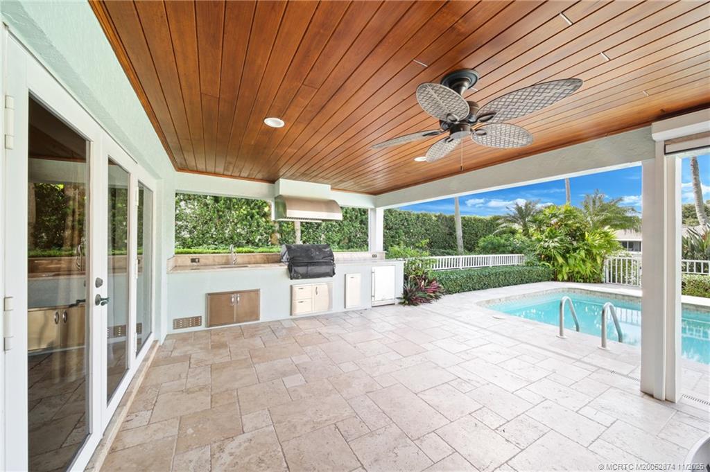 7 Island Road Stuart, FL 34996 - Photo 50 of 67 a view of a patio with a backyard