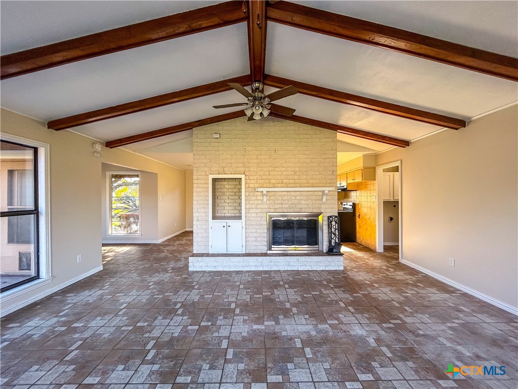 902 Joplin Street Victoria, TX 77904 - Photo 15 of 43 a view of a livingroom with a fireplace and window