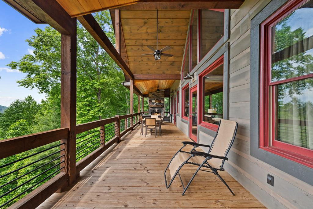 370 High Ridge Road Epworth, GA 30541 - Photo 34 of 61 a view of a chairs and table in the balcony