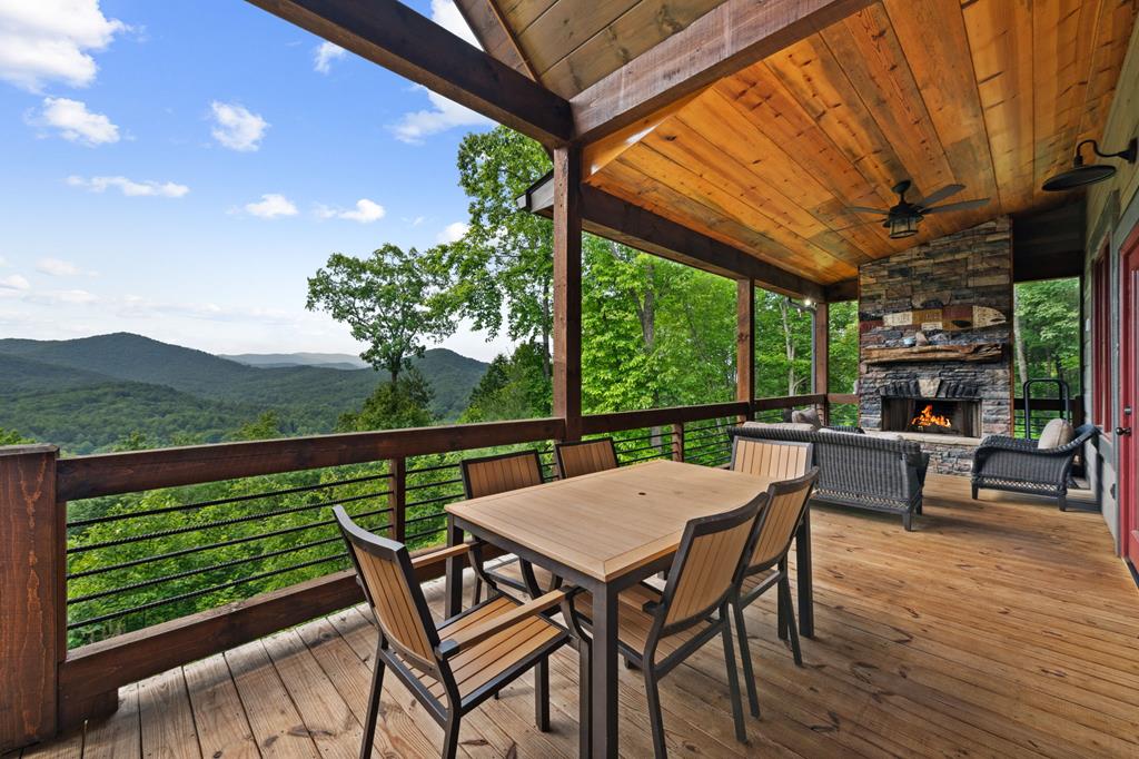 370 High Ridge Road Epworth, GA 30541 - Photo 36 of 61 a view of a patio with a table chairs and a backyard