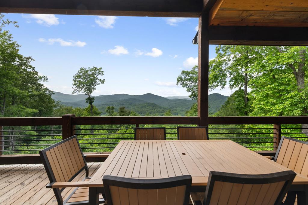 370 High Ridge Road Epworth, GA 30541 - Photo 39 of 61 a view of a balcony with lake view and wooden floor