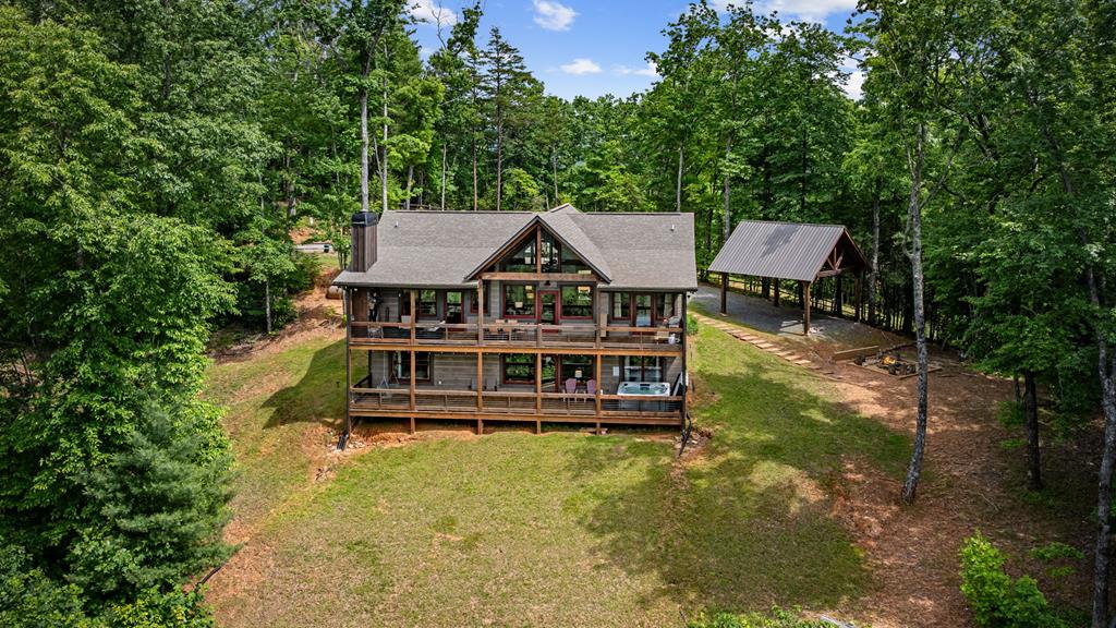 370 High Ridge Road Epworth, GA 30541 - Photo 54 of 61 an aerial view of a house with swimming pool and sitting area