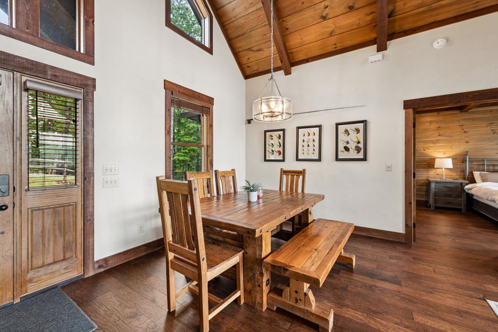 370 High Ridge Road Epworth, GA 30541 - Photo 8 of 61 a view of a dining room with furniture window and wooden floor