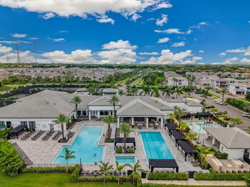 8593 Swinley Frst Way Boca Raton, FL 33434 - Photo 13 of 35 an aerial view of multiple houses with a big yard