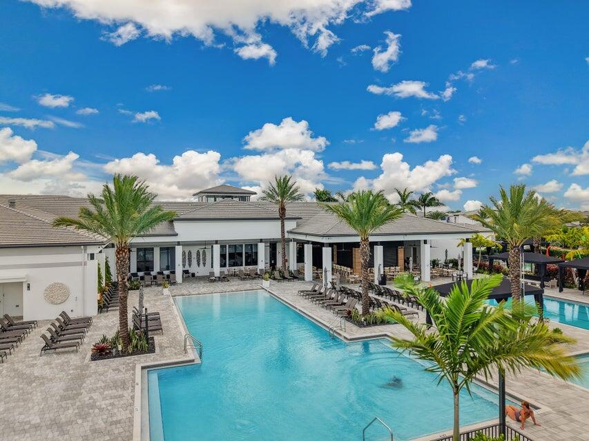 8593 Swinley Frst Way Boca Raton, FL 33434 - Photo 14 of 35 a view of a house with swimming pool and sitting area