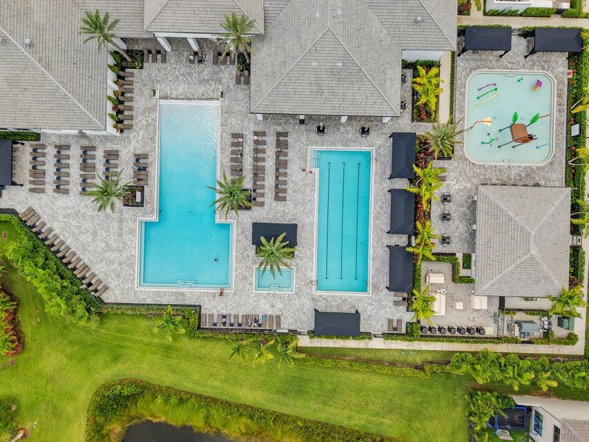 8593 Swinley Frst Way Boca Raton, FL 33434 - Photo 16 of 35 an aerial view of a house with a garden and swimming pool