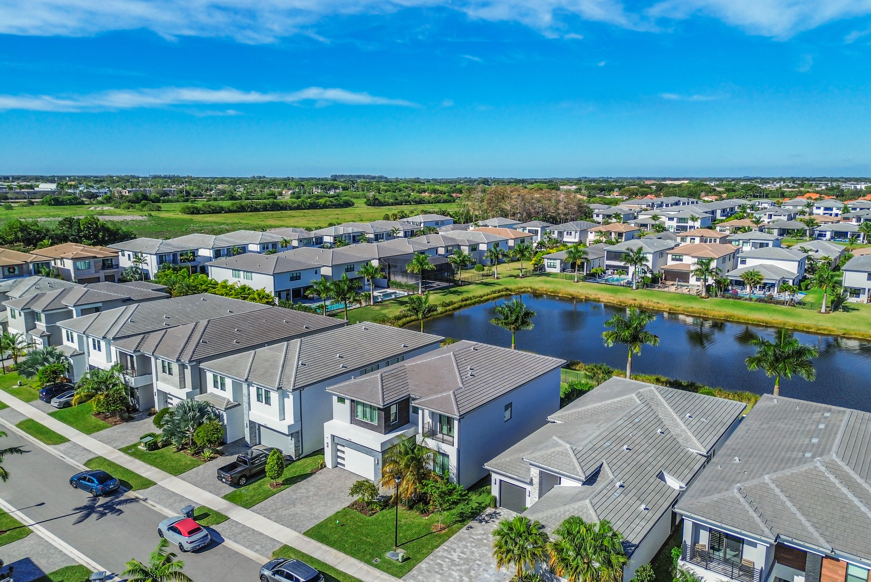 8593 Swinley Frst Way Boca Raton, FL 33434 - Photo 20 of 35 an aerial view of a house with a lake view