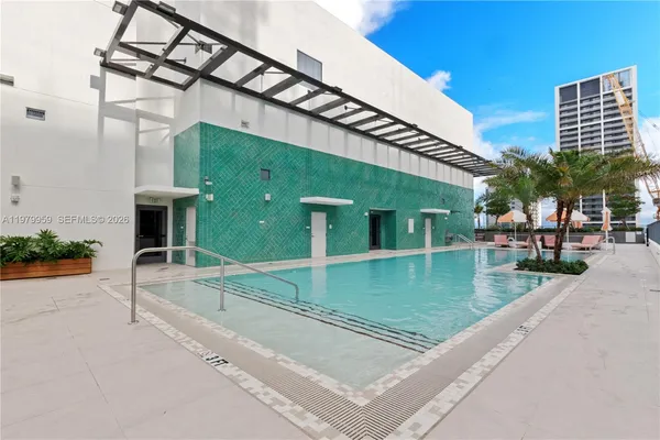 front view of a house with a swimming pool
