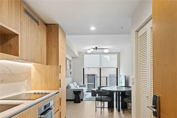 a very nice looking dining room with a table and chairs