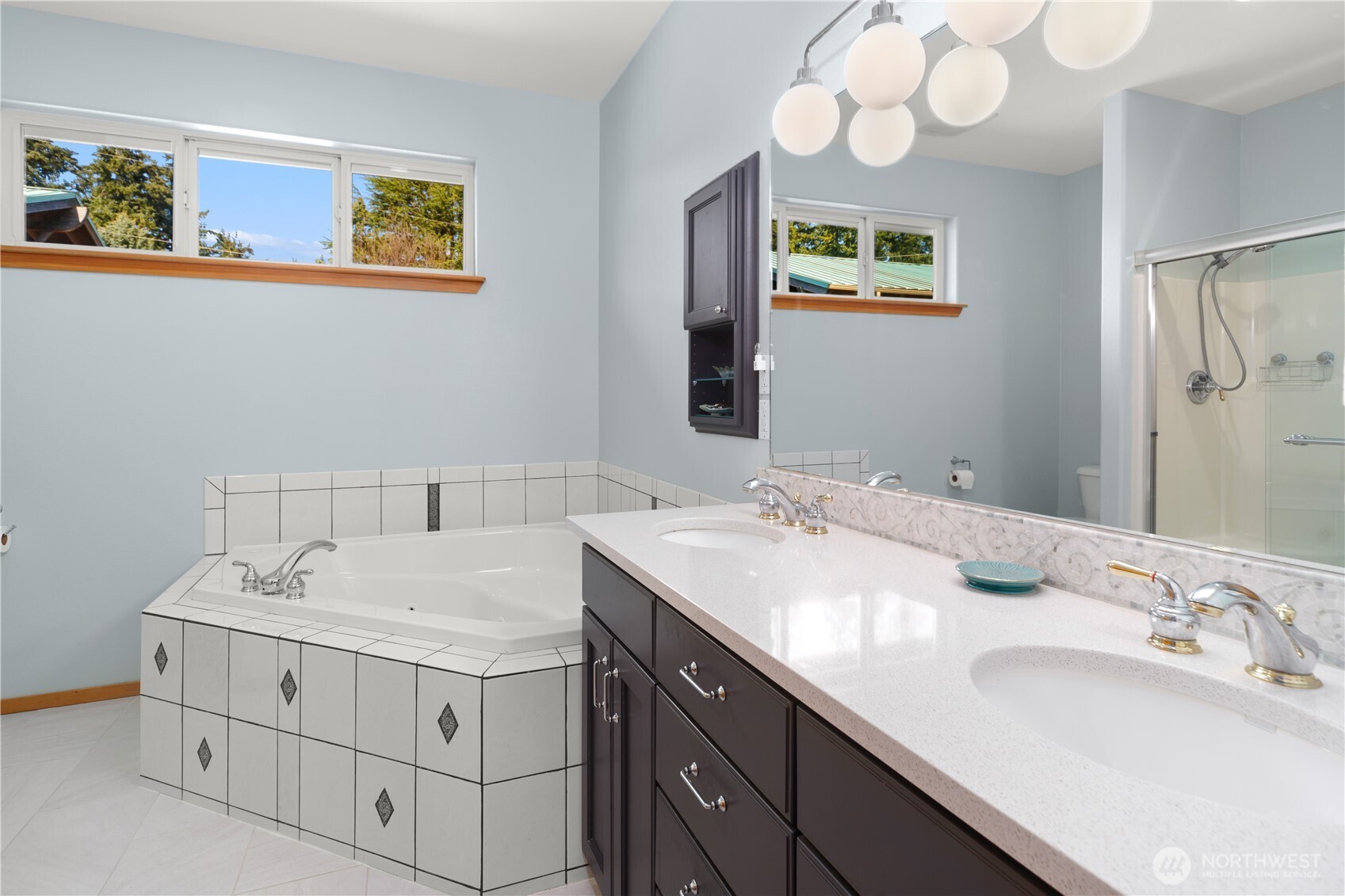 1355 Jackman Street Port Townsend, WA 98368 - Photo 16 of 38 a bathroom with a sink and a mirror