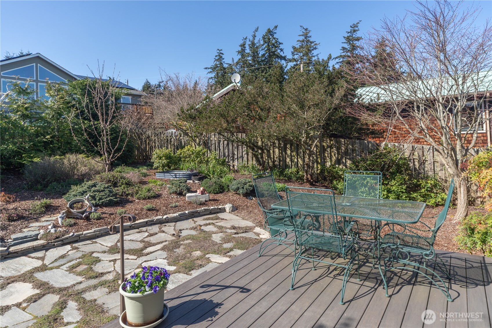 1355 Jackman Street Port Townsend, WA 98368 - Photo 37 of 38 a view of a chairs and table on the wooden deck