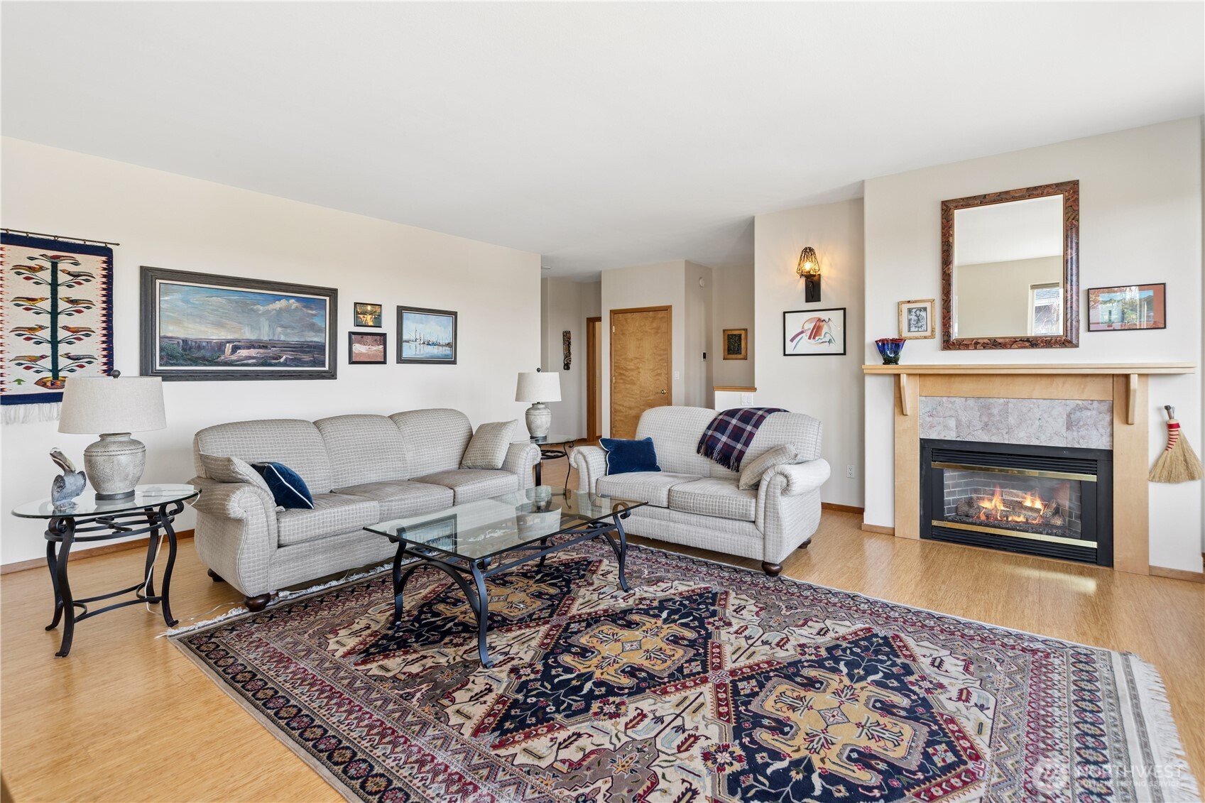 1355 Jackman Street Port Townsend, WA 98368 - Photo 5 of 38 a living room with furniture and a fireplace