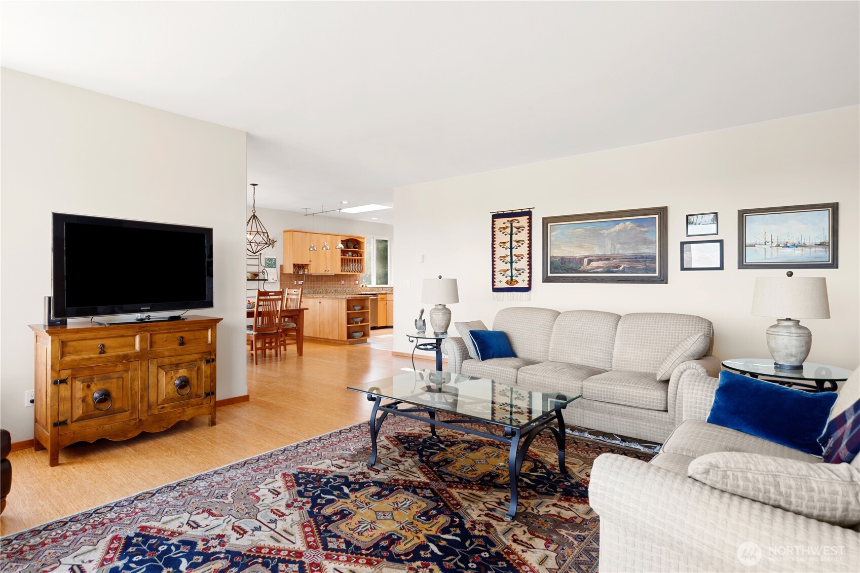 1355 Jackman Street Port Townsend, WA 98368 - Photo 7 of 38 a living room with furniture and a flat screen tv