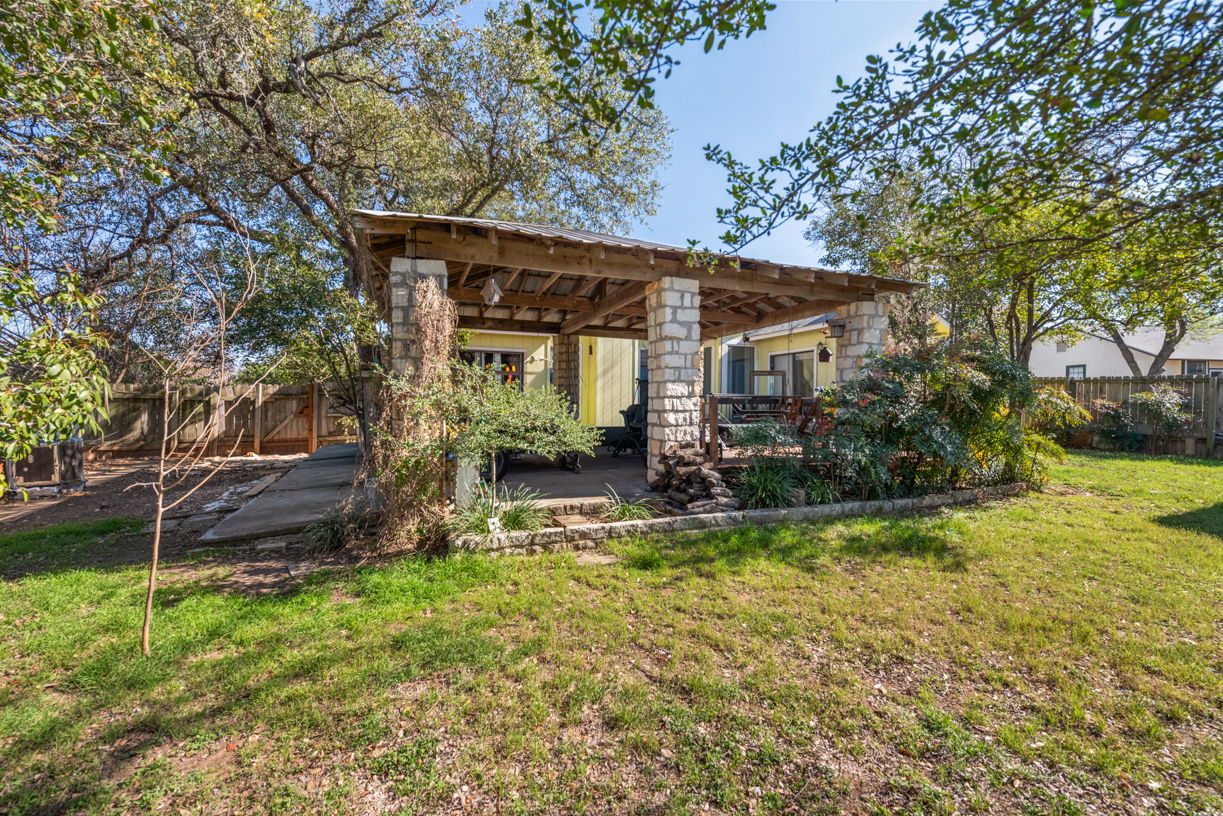 5726 Abilene Trail Austin, TX 78749 - Photo 3 of 29 a front view of a house with a yard