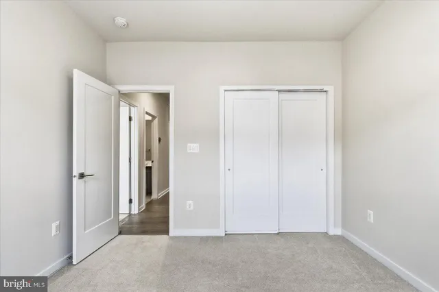 an empty room with closet