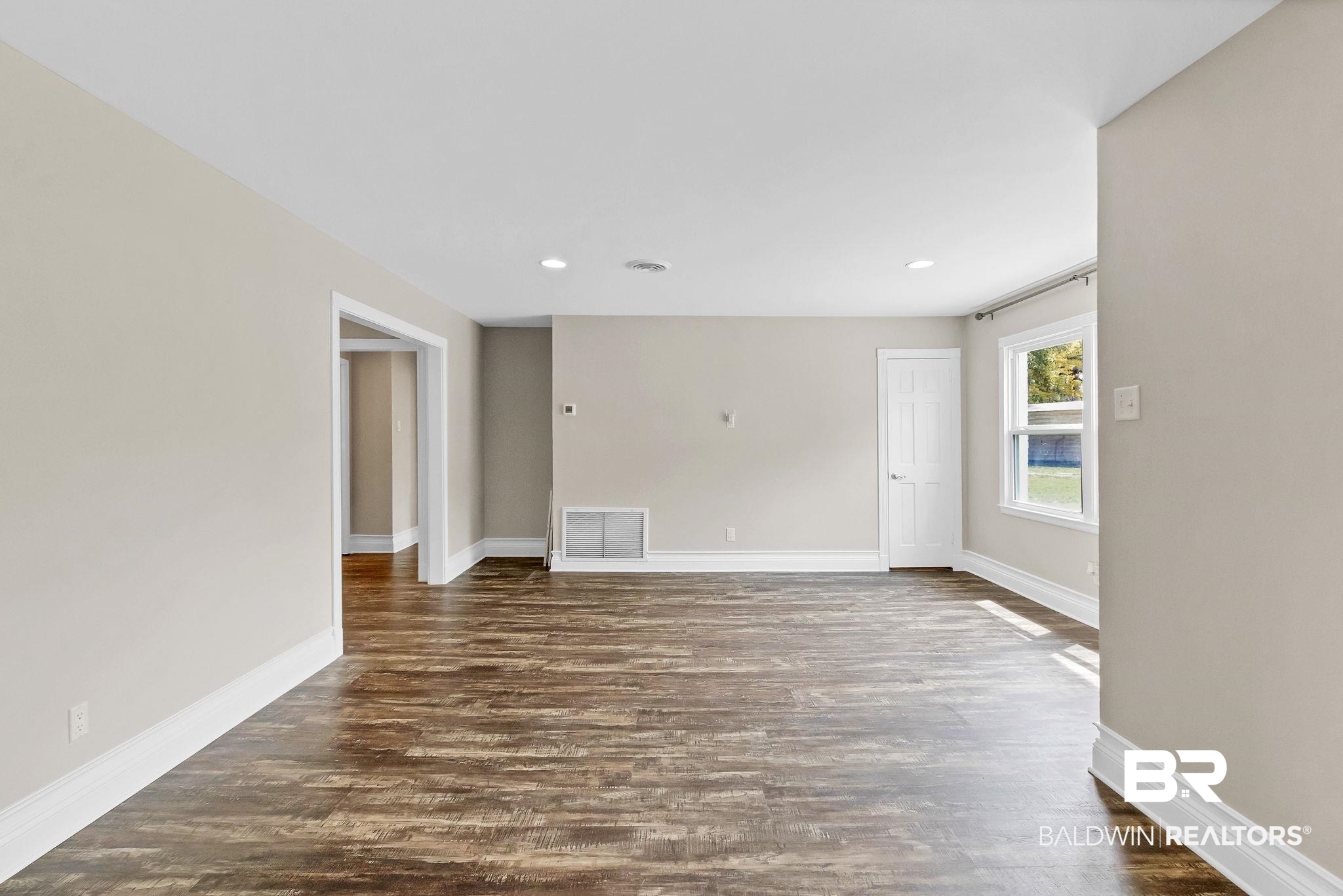 2901 Alston Court Mobile, AL 36605 - Photo 7 of 59 Living room featuring dark wood-style flooring, recessed lighting, baseboards, and visible vents