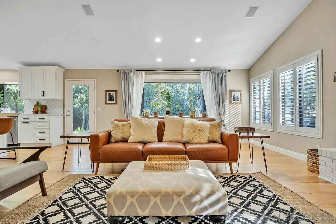 15867 Prairie Vista Road Poway, CA 92064 - Photo 26 of 70 a living room with furniture and large windows