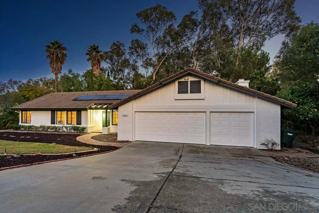 15867 Prairie Vista Road Poway, CA 92064 - Photo 3 of 70 a front view of a house with a yard and garage