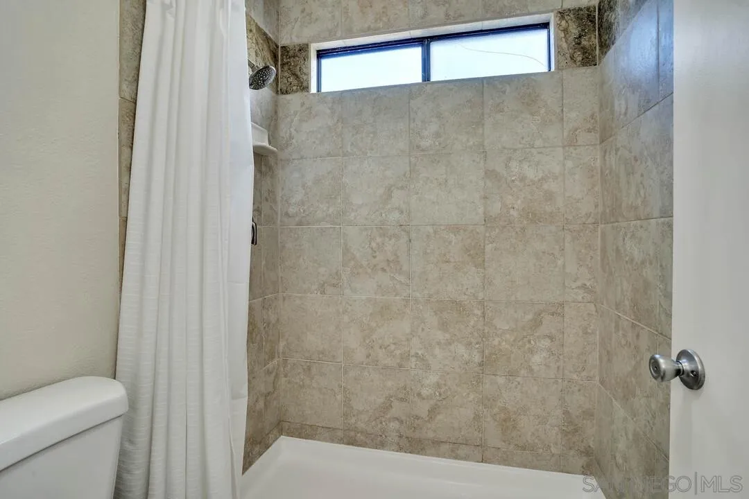 15867 Prairie Vista Road Poway, CA 92064 - Photo 36 of 70 a bathroom with a toilet and a shower