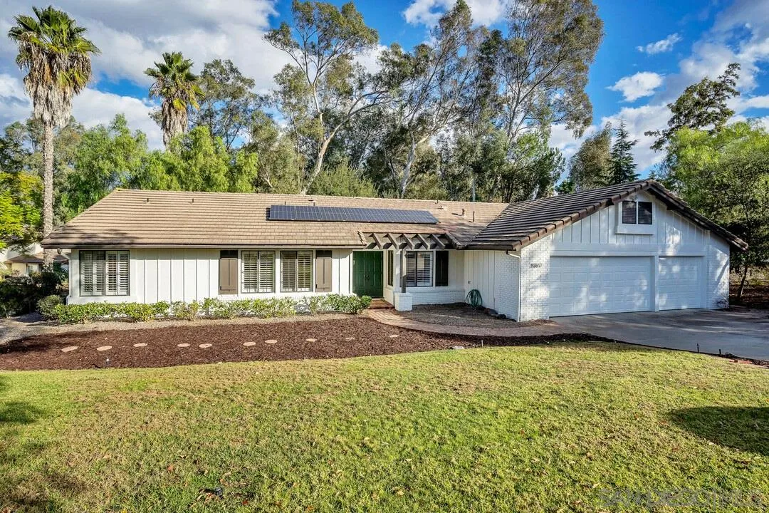 15867 Prairie Vista Road Poway, CA 92064 - Photo 4 of 70 a front view of a house with a yard