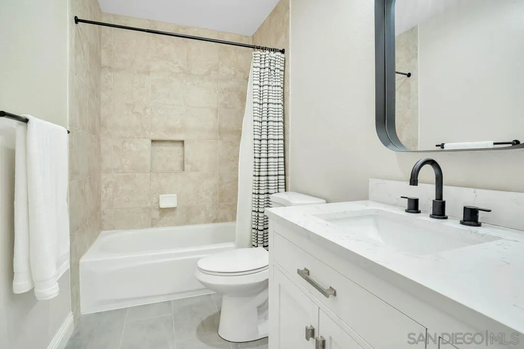 15867 Prairie Vista Road Poway, CA 92064 - Photo 45 of 70 a bathroom with a sink toilet and shower