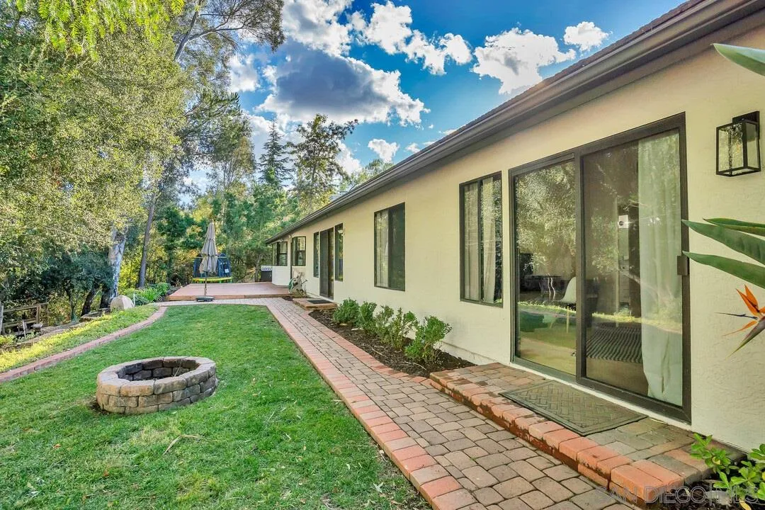 15867 Prairie Vista Road Poway, CA 92064 - Photo 46 of 70 a front view of a house with garden