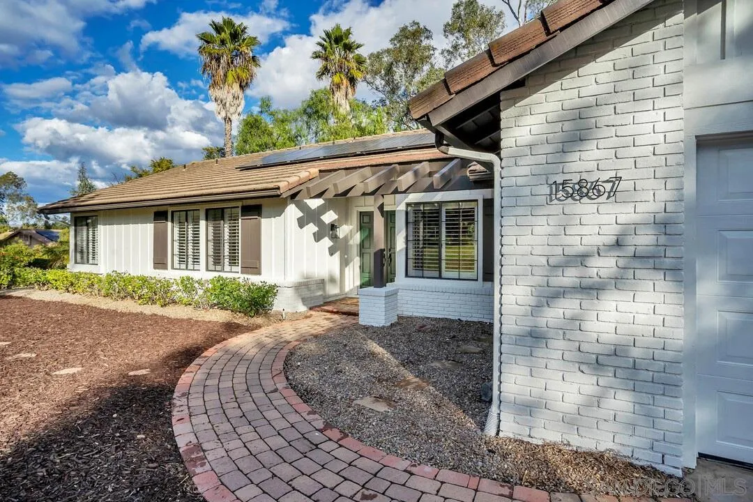 15867 Prairie Vista Road Poway, CA 92064 - Photo 5 of 70 a front view of a house with garden