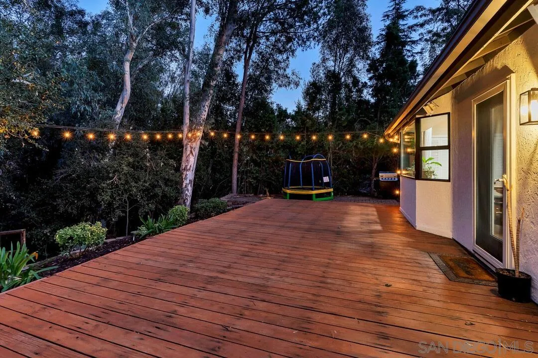 15867 Prairie Vista Road Poway, CA 92064 - Photo 66 of 70 a backyard of a house with wooden floor and large trees