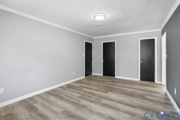 a view of a room with windows