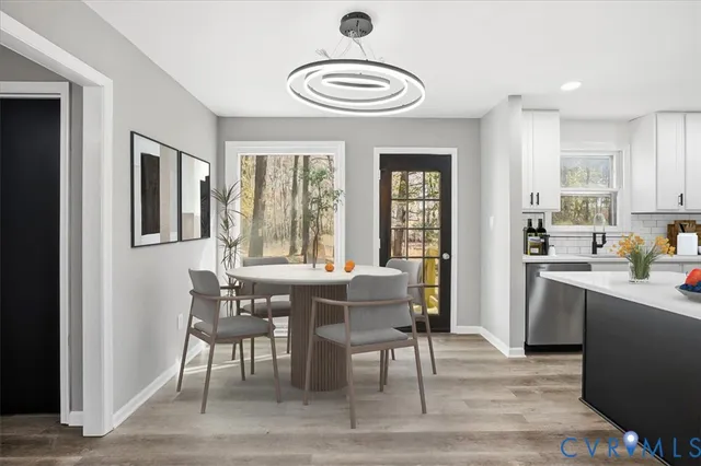 a bedroom with bed and a night stand