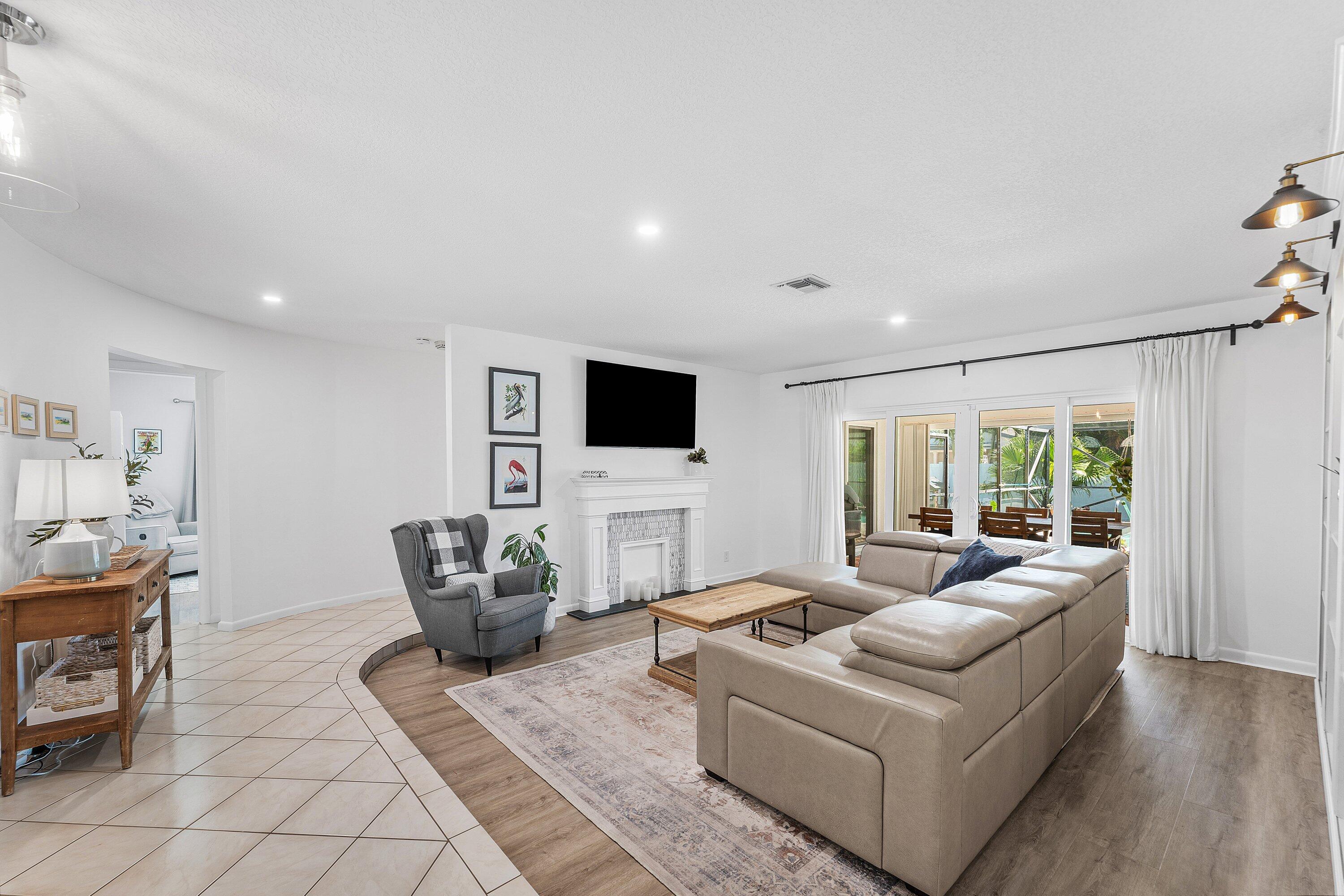17680 Pine Needle Terrace Boca Raton, FL 33487 - Photo 5 of 60 Living Room w/ Tiled Feux Fireplace
