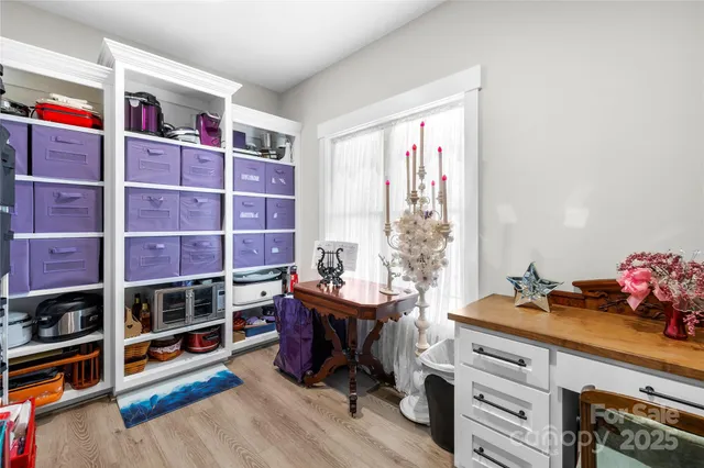 a bedroom with a bed and a cabinets