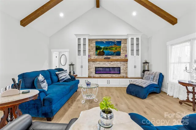 a view of entryway with a couch and a window