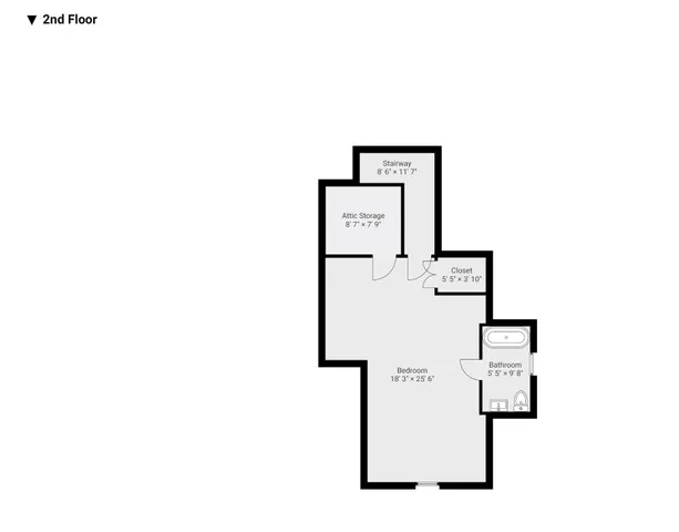 a bedroom with a bed and a cabinets