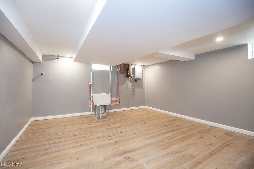 1547 Genesee Road South Euclid, OH 44121 - Photo 26 of 36 Finished basement featuring baseboards, light wood-style floors, and recessed lighting