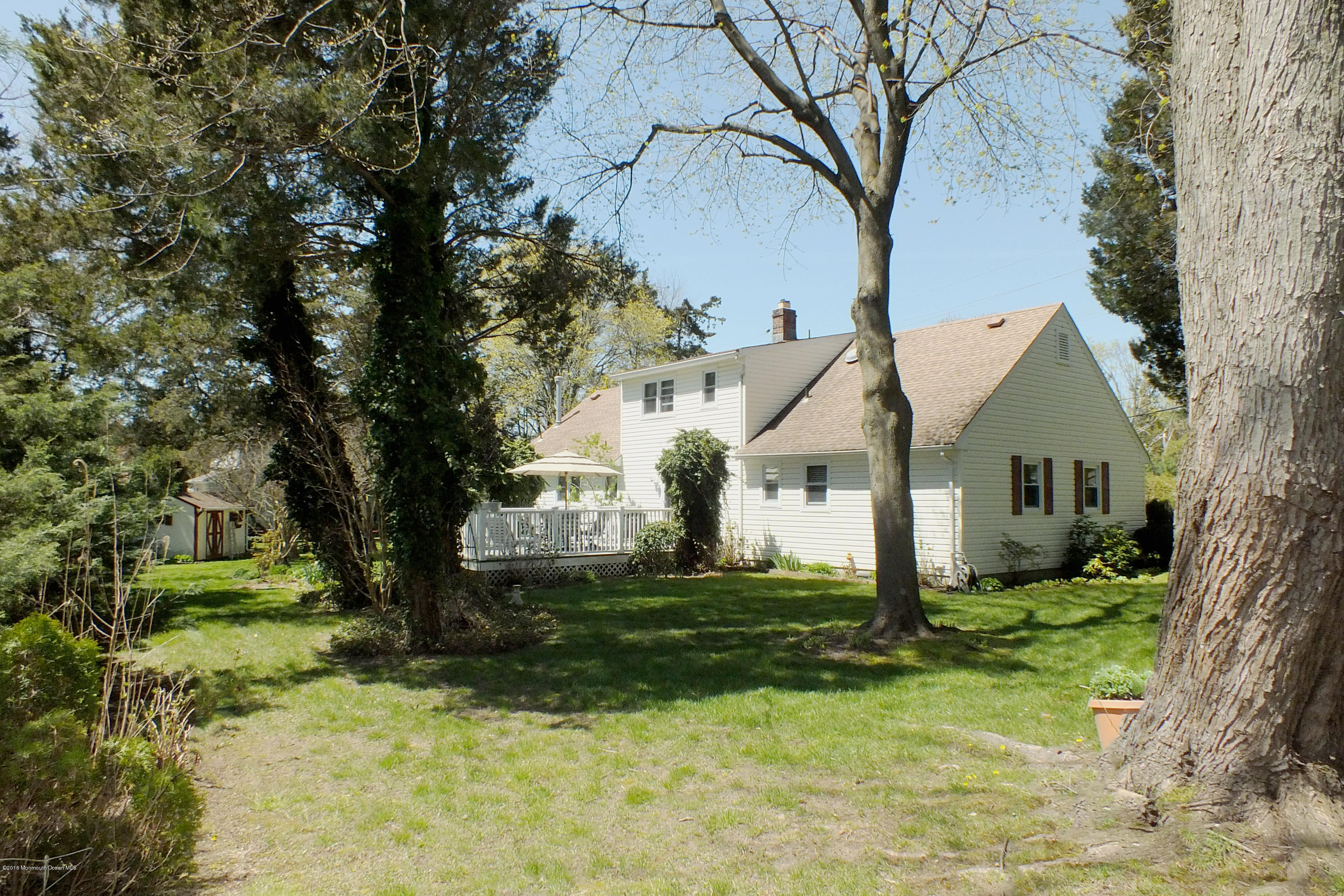 2305 Lanes Mill Road Brick, NJ 08724 - Photo 26 of 29 Yard & Rear Elevation
