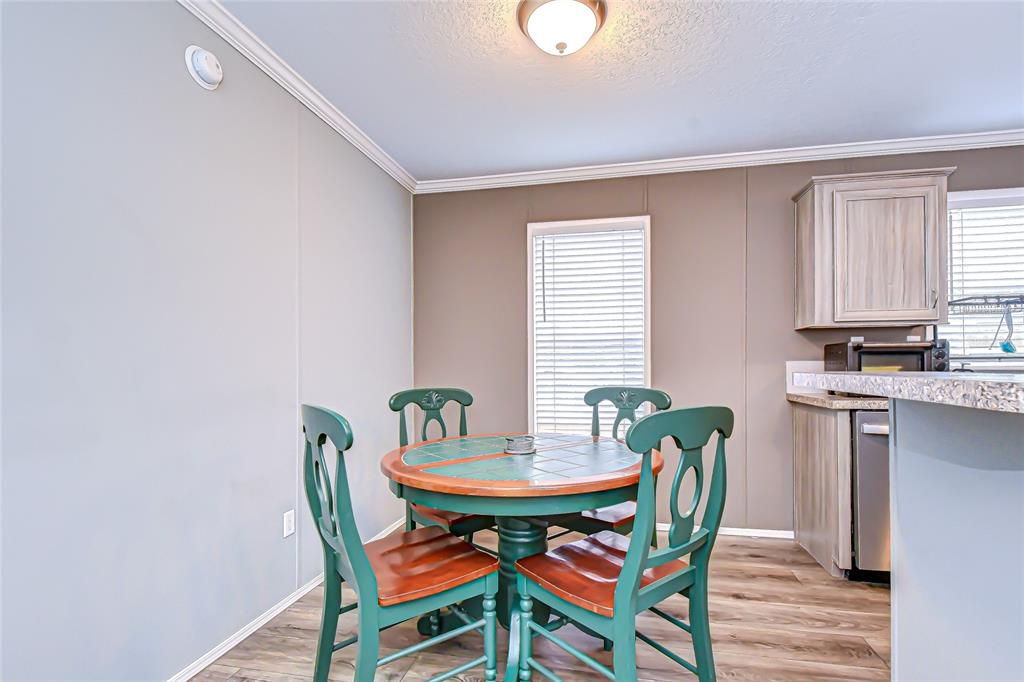 37749 Geiger Road Zephyrhills, FL 33542 - Photo 16 of 36 a view of a dining room with furniture and window