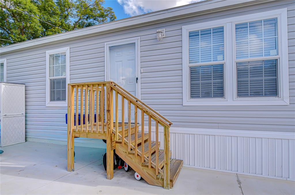 37749 Geiger Road Zephyrhills, FL 33542 - Photo 3 of 36 a view of wooden house with a small space